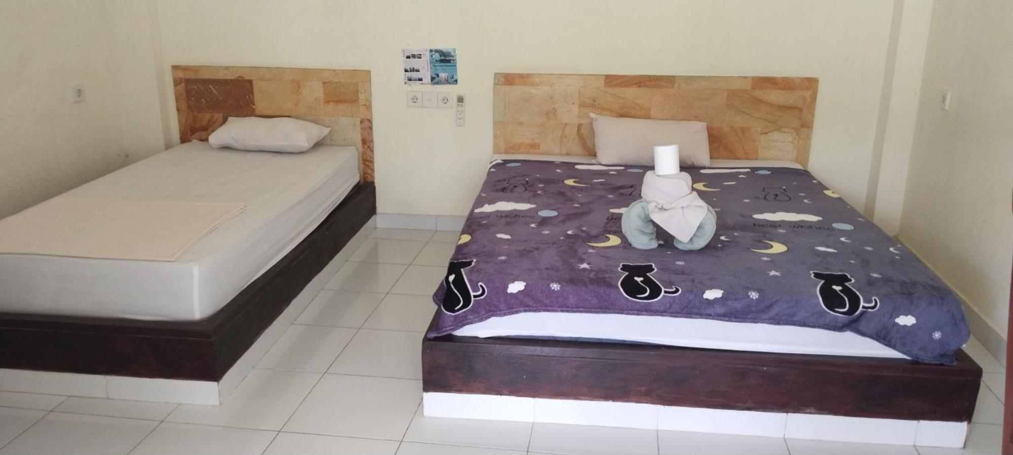 Amed Stop Inn Homestay, Rooftop Restaurant And Bar 외부 사진