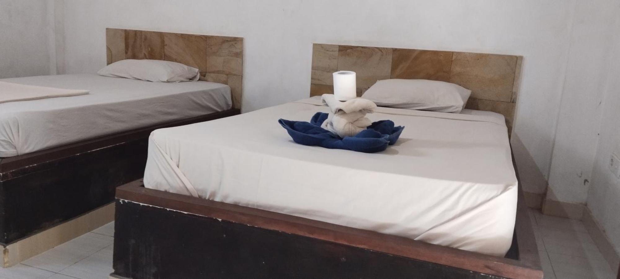 Amed Stop Inn Homestay, Rooftop Restaurant And Bar 외부 사진