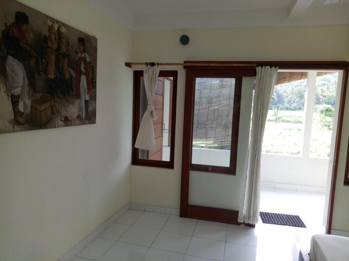 Amed Stop Inn Homestay, Rooftop Restaurant And Bar 외부 사진