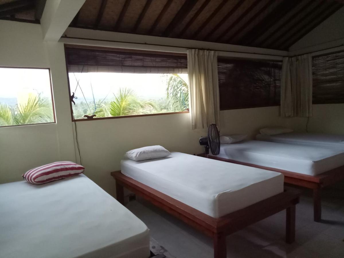 Amed Stop Inn Homestay, Rooftop Restaurant And Bar 외부 사진
