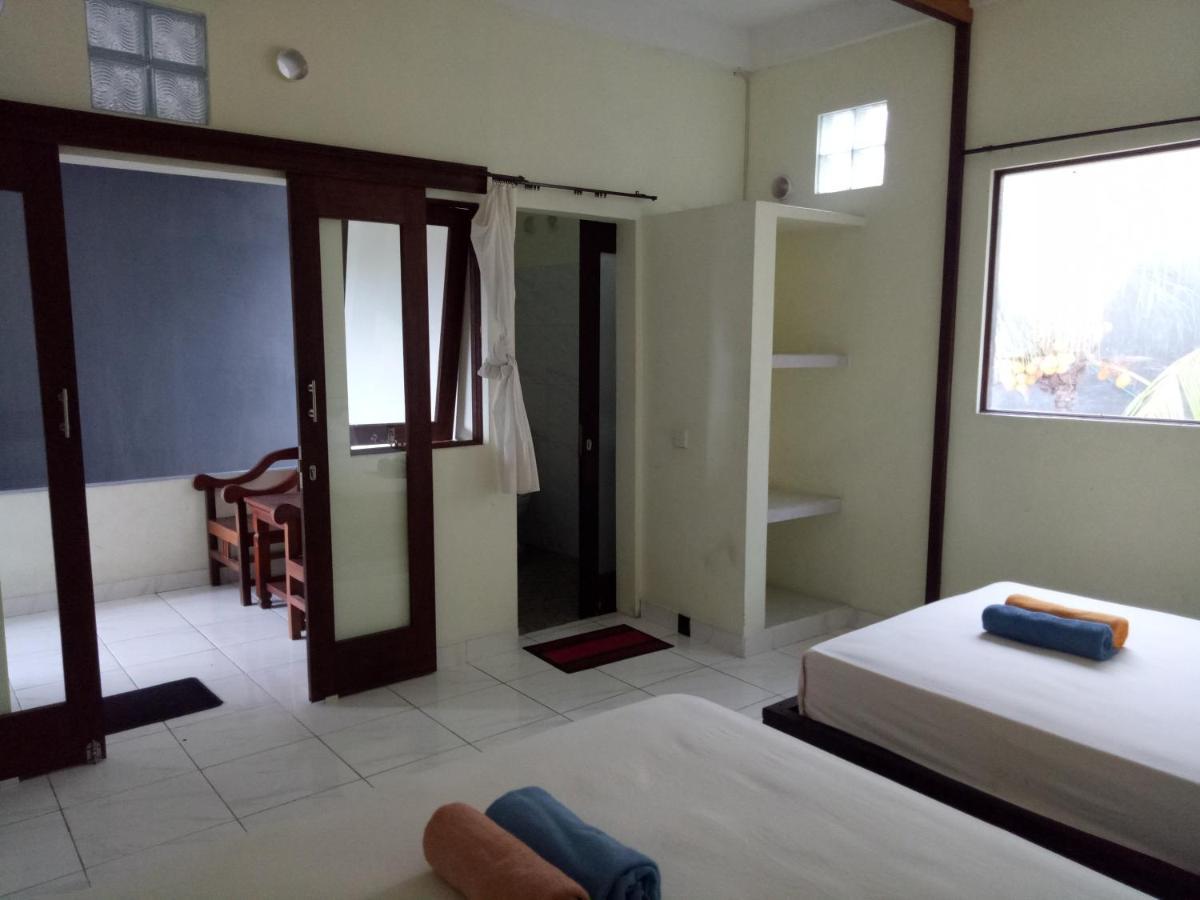 Amed Stop Inn Homestay, Rooftop Restaurant And Bar 외부 사진